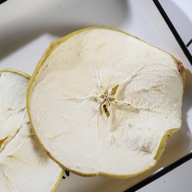 Dried apple slices close-up used for snack and garnish formats